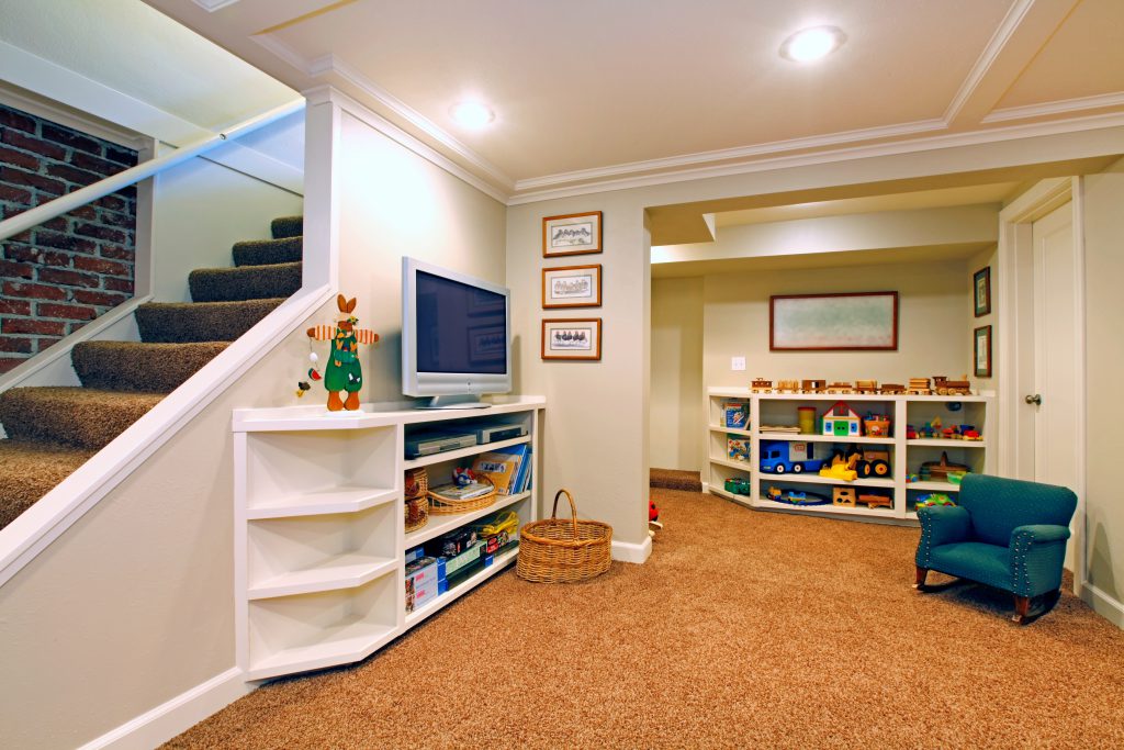 Play room in a  white basement living room